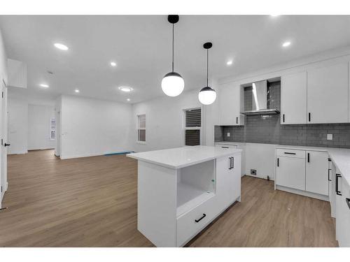 824 Midtown Drive Sw, Airdrie, AB - Indoor Photo Showing Kitchen With Upgraded Kitchen