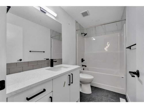 824 Midtown Drive Sw, Airdrie, AB - Indoor Photo Showing Bathroom