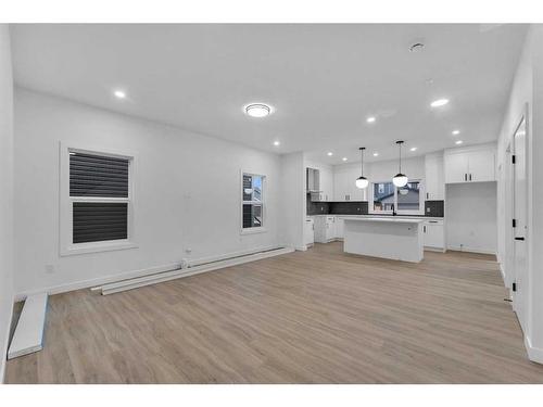 824 Midtown Drive Sw, Airdrie, AB - Indoor Photo Showing Kitchen