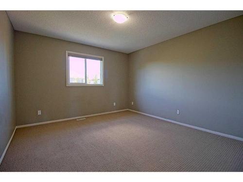 109 Bridlerange Place Sw, Calgary, AB - Indoor Photo Showing Other Room