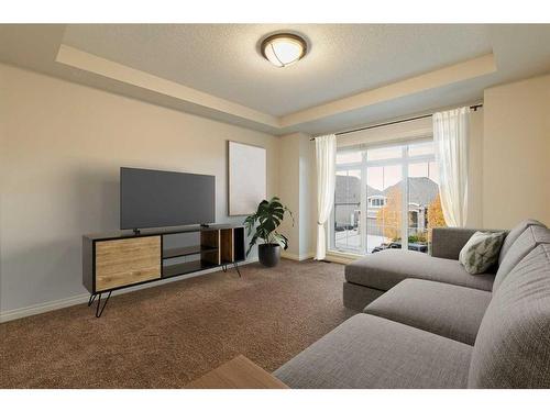 309 Marquis Landing Se, Calgary, AB - Indoor Photo Showing Living Room