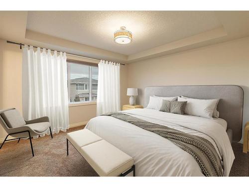 309 Marquis Landing Se, Calgary, AB - Indoor Photo Showing Bedroom