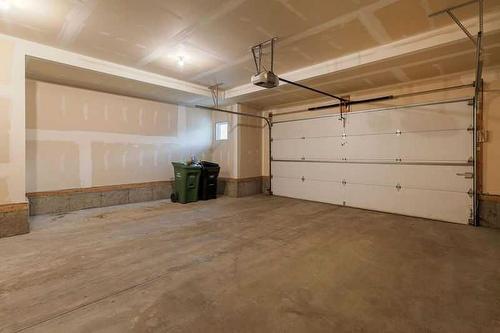 309 Marquis Landing Se, Calgary, AB - Indoor Photo Showing Garage