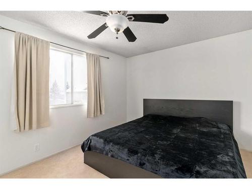 88 Riverbrook Place, Calgary, AB - Indoor Photo Showing Bedroom