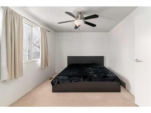 88 Riverbrook Place, Calgary, AB - Indoor Photo Showing Bedroom