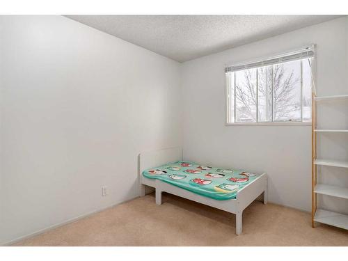 88 Riverbrook Place, Calgary, AB - Indoor Photo Showing Bedroom