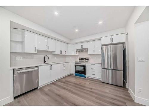 227 Saratoga Place Ne, Calgary, AB - Indoor Photo Showing Kitchen With Stainless Steel Kitchen