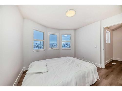 227 Saratoga Place Ne, Calgary, AB - Indoor Photo Showing Bedroom