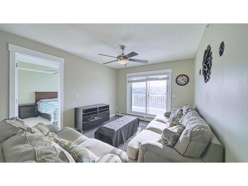 1406-302 Skyview Ranch Drive Ne, Calgary, AB - Indoor Photo Showing Living Room With Fireplace