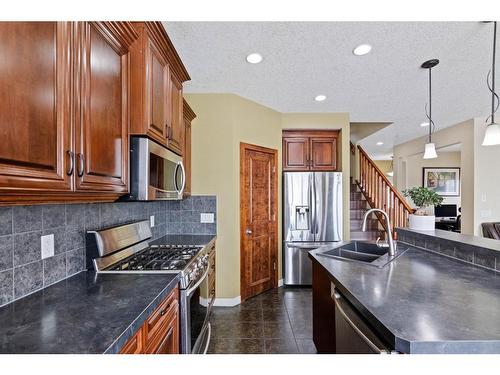 173 Everoak Circle Sw, Calgary, AB - Indoor Photo Showing Kitchen With Stainless Steel Kitchen With Double Sink With Upgraded Kitchen