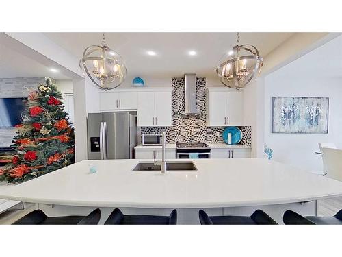 150 Yorkville Green Sw, Calgary, AB - Indoor Photo Showing Kitchen With Double Sink With Upgraded Kitchen