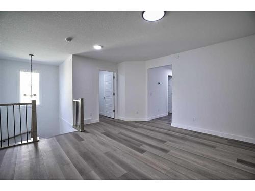 87 Hotchkiss Manor Se, Calgary, AB - Indoor Photo Showing Other Room