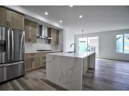 87 Hotchkiss Manor Se, Calgary, AB - Indoor Photo Showing Kitchen With Stainless Steel Kitchen With Upgraded Kitchen