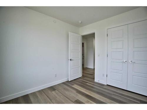 87 Hotchkiss Manor Se, Calgary, AB - Indoor Photo Showing Other Room