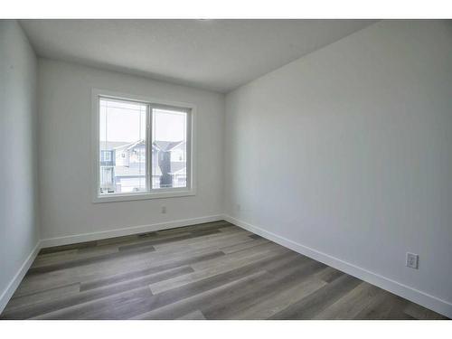 87 Hotchkiss Manor Se, Calgary, AB - Indoor Photo Showing Other Room