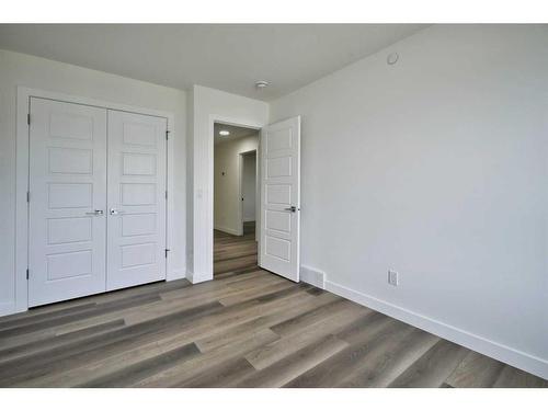 87 Hotchkiss Manor Se, Calgary, AB - Indoor Photo Showing Other Room