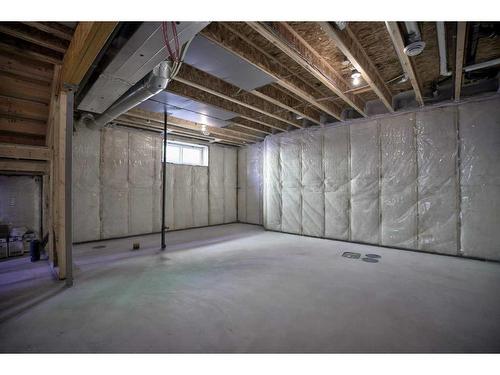 87 Hotchkiss Manor Se, Calgary, AB - Indoor Photo Showing Basement