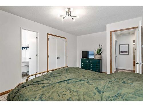 12040 Candiac Road Sw, Calgary, AB - Indoor Photo Showing Bedroom