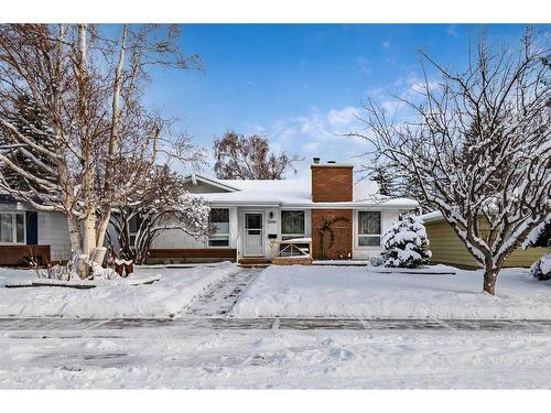 12040 Candiac Road Sw, Calgary, AB - Outdoor With Facade