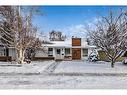 12040 Candiac Road Sw, Calgary, AB  - Outdoor With Facade 