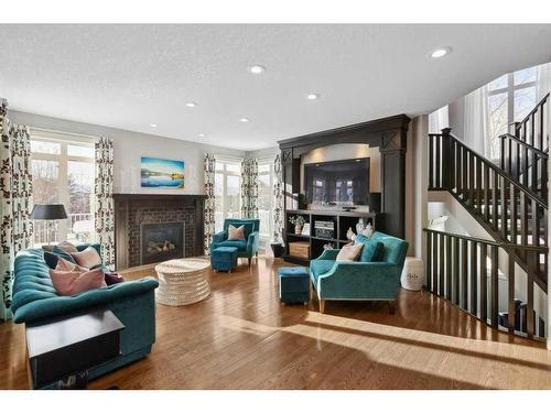 27 Auburn Sound Cove Se, Calgary, AB - Indoor Photo Showing Living Room With Fireplace