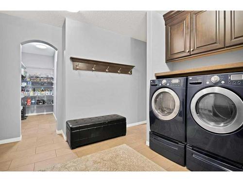 27 Auburn Sound Cove Se, Calgary, AB - Indoor Photo Showing Laundry Room