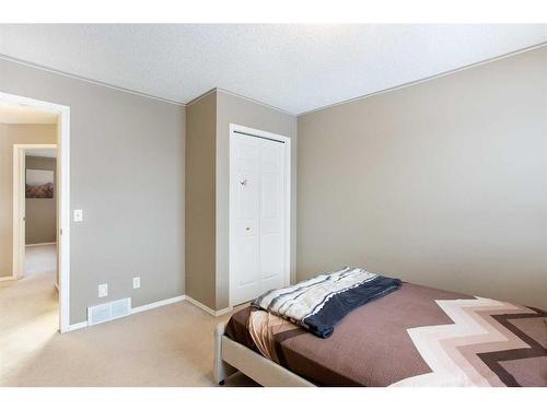 12 Panamount Crescent Nw, Calgary, AB - Indoor Photo Showing Bedroom