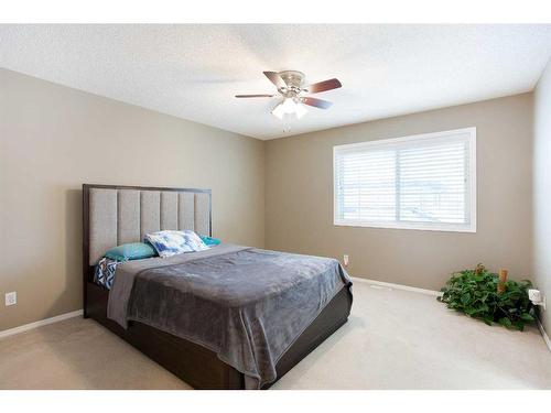 12 Panamount Crescent Nw, Calgary, AB - Indoor Photo Showing Bedroom