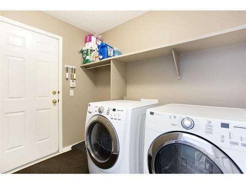 12 Panamount Crescent Nw, Calgary, AB - Indoor Photo Showing Laundry Room