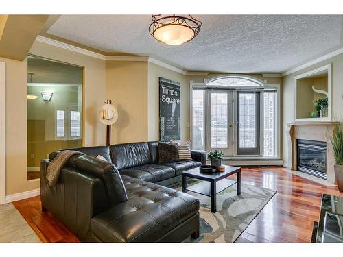 507-1315 12 Avenue Sw, Calgary, AB - Indoor Photo Showing Living Room With Fireplace