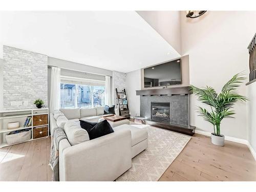 61 Mahogany Square Se, Calgary, AB - Indoor Photo Showing Living Room With Fireplace