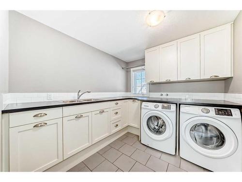 61 Mahogany Square Se, Calgary, AB - Indoor Photo Showing Laundry Room