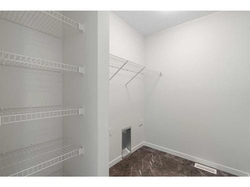 455 Tekarra Drive Nw, Calgary, AB - Indoor With Storage