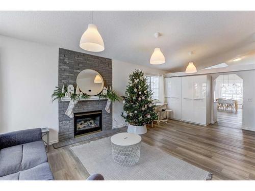 124 Harvest Park Way Ne, Calgary, AB - Indoor Photo Showing Living Room With Fireplace