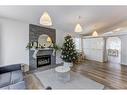 124 Harvest Park Way Ne, Calgary, AB  - Indoor Photo Showing Living Room With Fireplace 