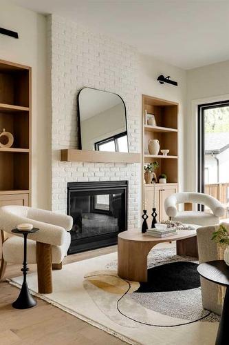 42 Rockcliff Heights Nw, Calgary, AB - Indoor Photo Showing Living Room With Fireplace