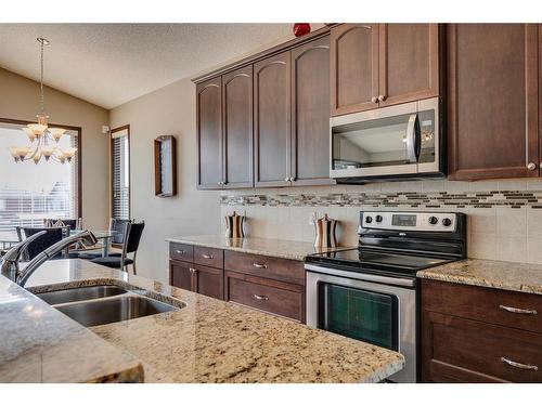 33 Evansview Manor Nw, Calgary, AB - Indoor Photo Showing Kitchen With Stainless Steel Kitchen With Double Sink