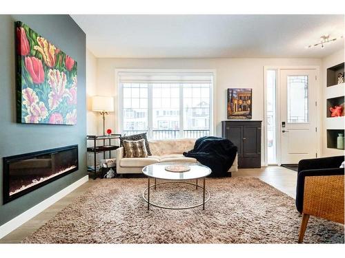 382 Sundown Road, Cochrane, AB - Indoor Photo Showing Living Room