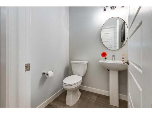 382 Sundown Road, Cochrane, AB - Indoor Photo Showing Kitchen With Double Sink With Upgraded Kitchen