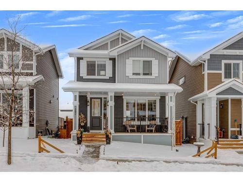 382 Sundown Road, Cochrane, AB - Outdoor With Facade