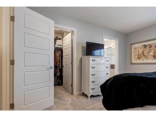 382 Sundown Road, Cochrane, AB - Indoor Photo Showing Bedroom