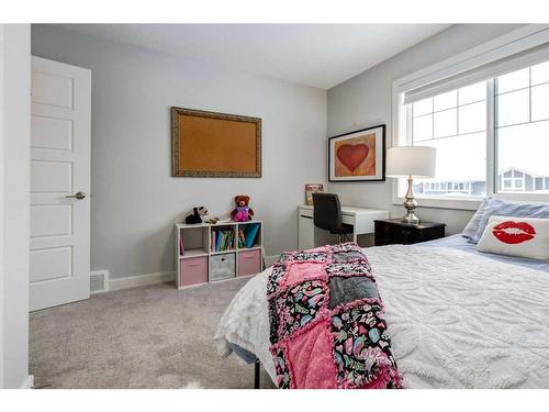 382 Sundown Road, Cochrane, AB - Indoor Photo Showing Bedroom