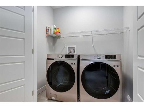 382 Sundown Road, Cochrane, AB - Indoor Photo Showing Laundry Room