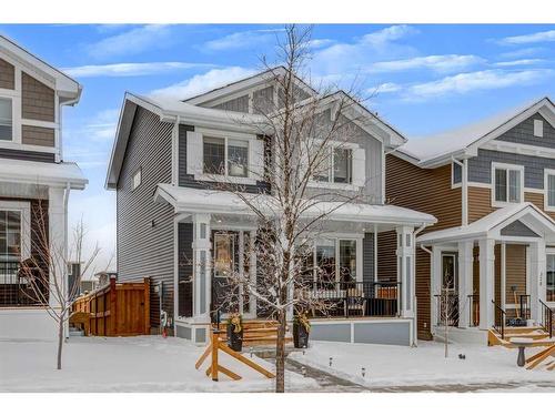 382 Sundown Road, Cochrane, AB - Outdoor With Facade