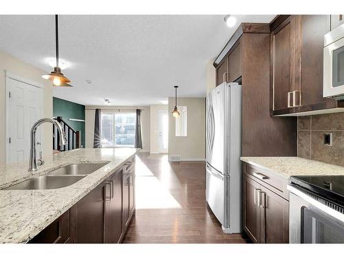 149 Walden Parade Se, Calgary, AB - Indoor Photo Showing Kitchen With Double Sink With Upgraded Kitchen