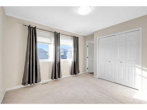 149 Walden Parade Se, Calgary, AB - Indoor Photo Showing Bedroom