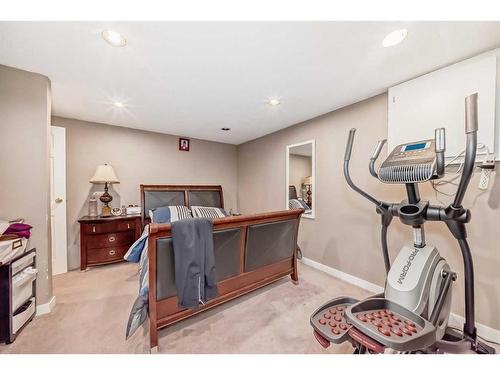 16 Taraglen Road Ne, Calgary, AB - Indoor Photo Showing Gym Room