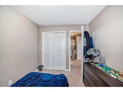 16 Taraglen Road Ne, Calgary, AB - Indoor Photo Showing Bedroom