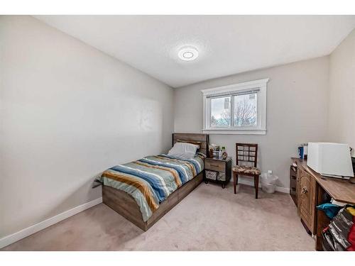 16 Taraglen Road Ne, Calgary, AB - Indoor Photo Showing Bedroom