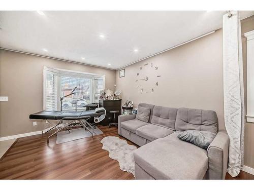 16 Taraglen Road Ne, Calgary, AB - Indoor Photo Showing Living Room